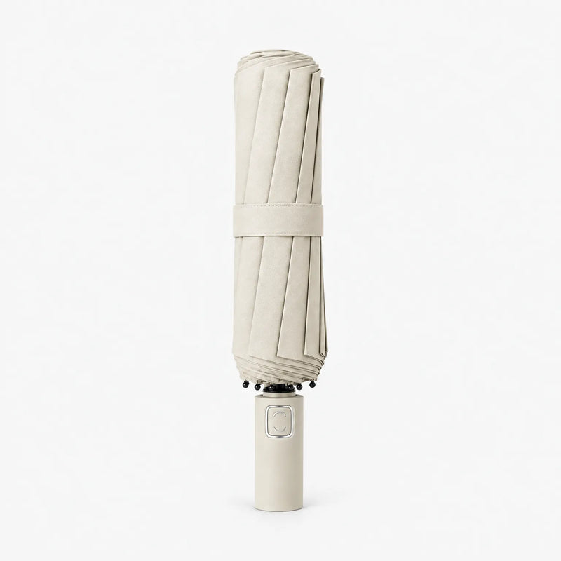 Folded cream-colored umbrella with a matching strap and handle, shown upright on a white background. 10