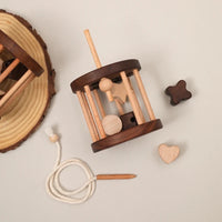 Wooden puzzle with basic shapes for children – learning game to develop motor skills
