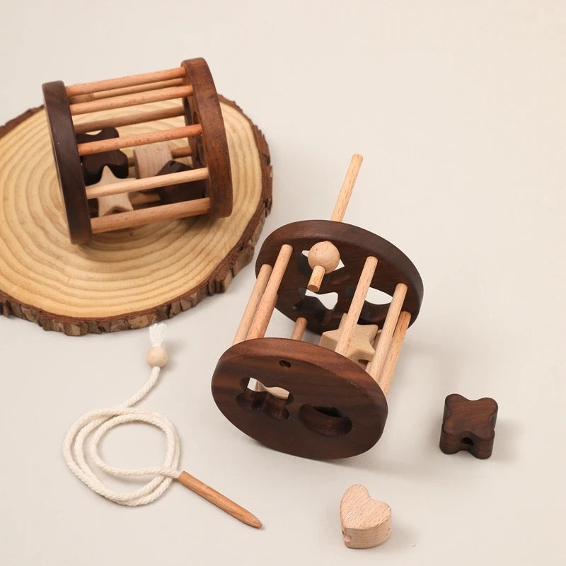 Wooden puzzle with basic shapes for children – learning game to develop motor skills