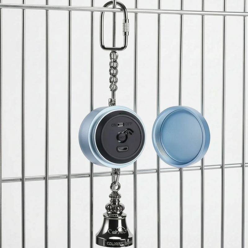 Blue version hanging from cage bars with its screw-off cap removed beside it, revealing the black panel with switch, record button and charging port. 5