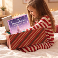 Smiling girl in red-striped pyjamas sitting on a bed, lifting a purple advent calendar box out of a striped gift box. 3