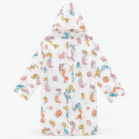 Flat lay of the clear hooded raincoat printed with colourful mermaids and seashells, fastened with snap buttons. 9