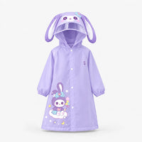 Lilac bunny raincoat on a plain background, with long floppy ears on the hood, clear visor, snap front and a bunny-on-cloud print. 10