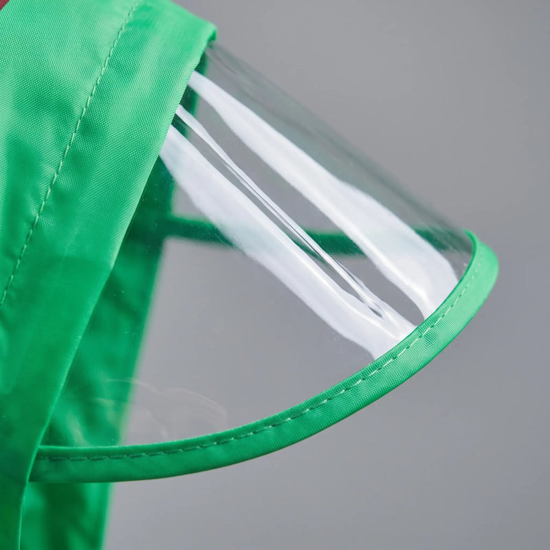 Close-up of the green hood's clear transparent visor edged with green fabric binding and stitching. 6