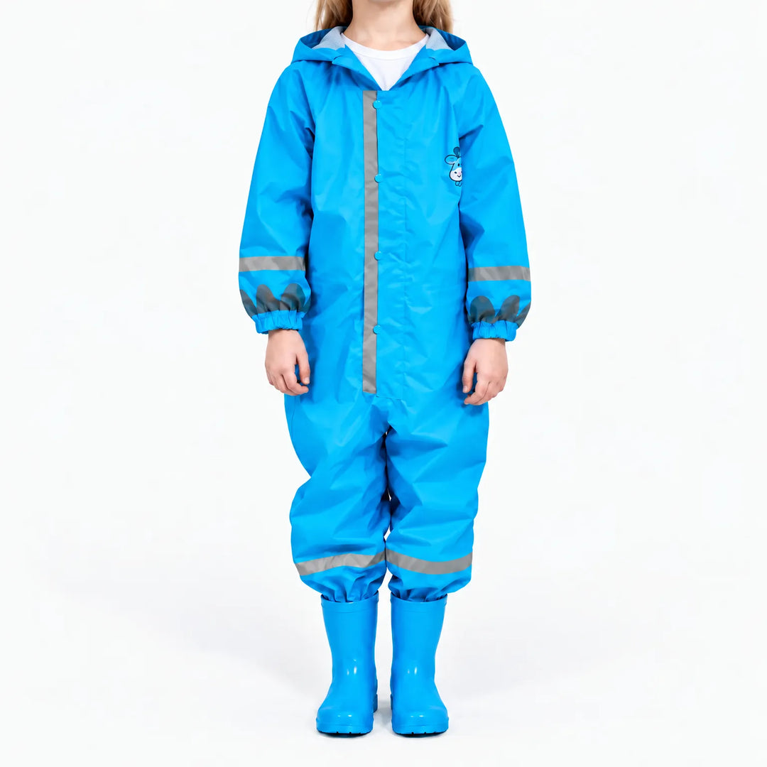 Front view of a child in the blue hooded rain jumpsuit with reflective stripes, snap buttons, elastic cuffs and matching blue boots. 8