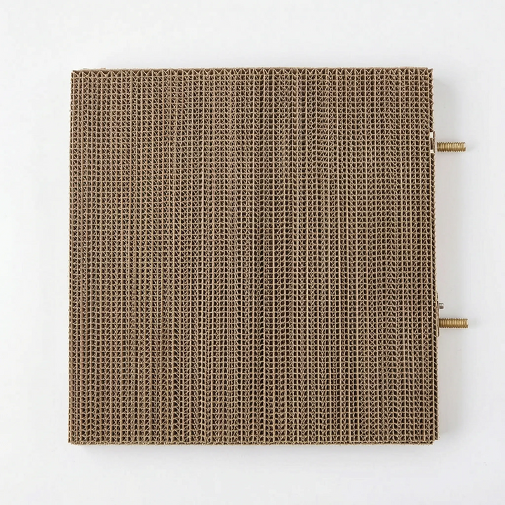 Top-down view of the square cardboard platform with two threaded metal fixing bolts protruding from one side. 5