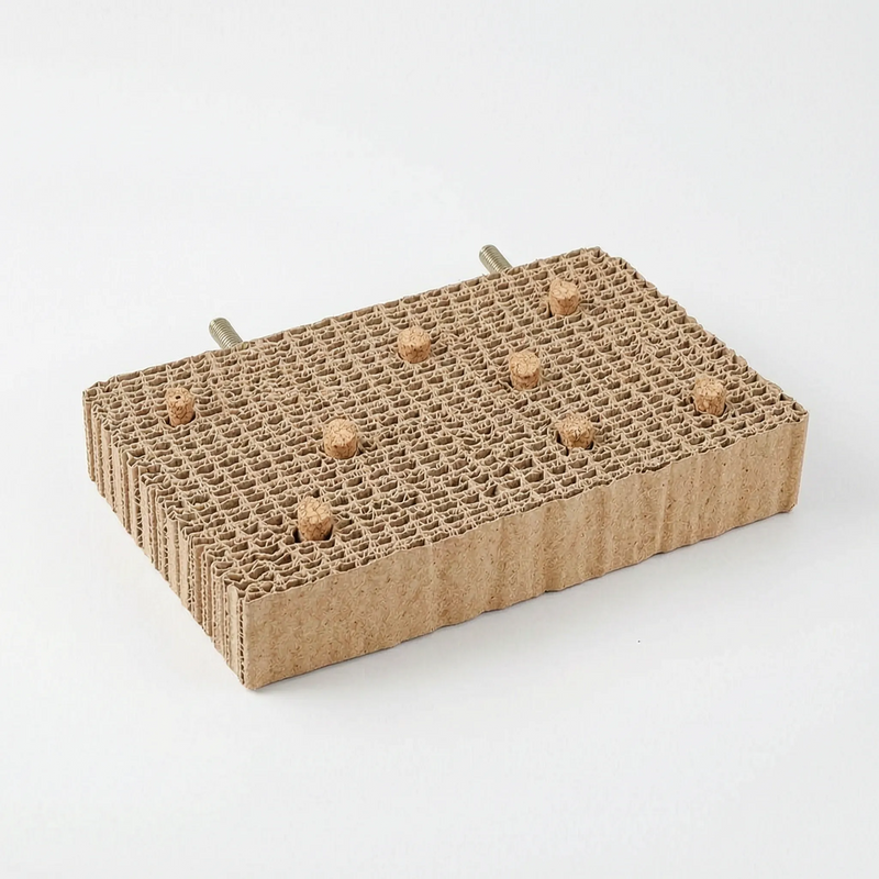 Thick rectangular cardboard platform with cork stoppers inserted into the cells and two threaded bolts at the back. 8