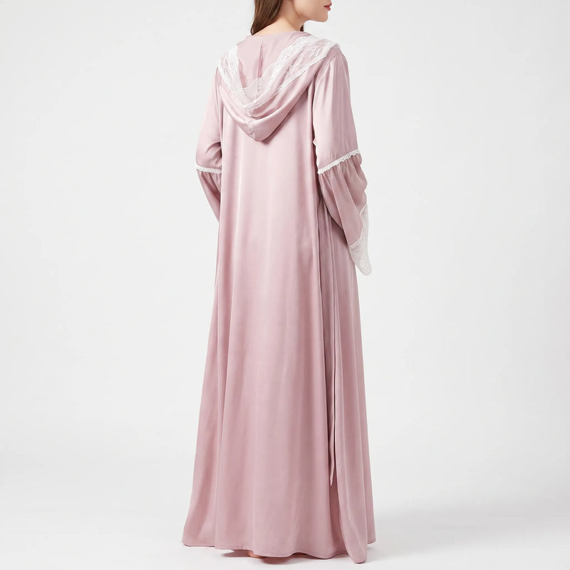 Back view of the pink satin robe on a model, showing the lace-trimmed hood and flared sleeves. 2
