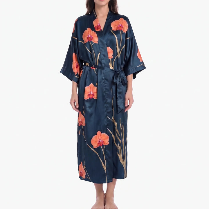 Navy satin robe with large orange orchid blooms and golden stems, tied at the waist with a matching belt. 13