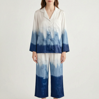 Front view of the model in the white-to-navy ombre pyjama set with cropped wide-leg trousers against a light backdrop. 8