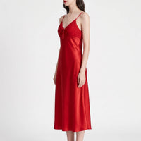 Three-quarter side view of the red satin nightdress on a model, showing the fitted bodice and long straight silhouette. 4