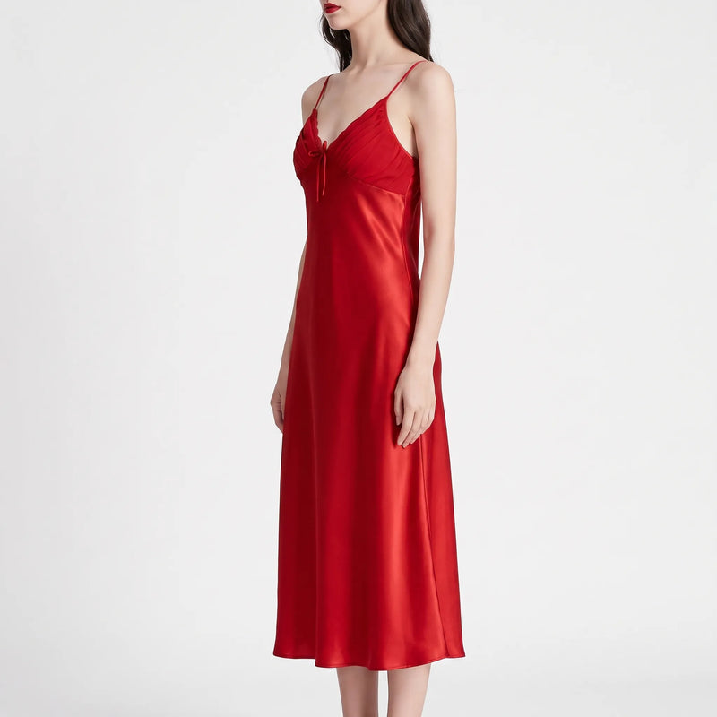Three-quarter side view of the red satin nightdress on a model, showing the fitted bodice and long straight silhouette. 4