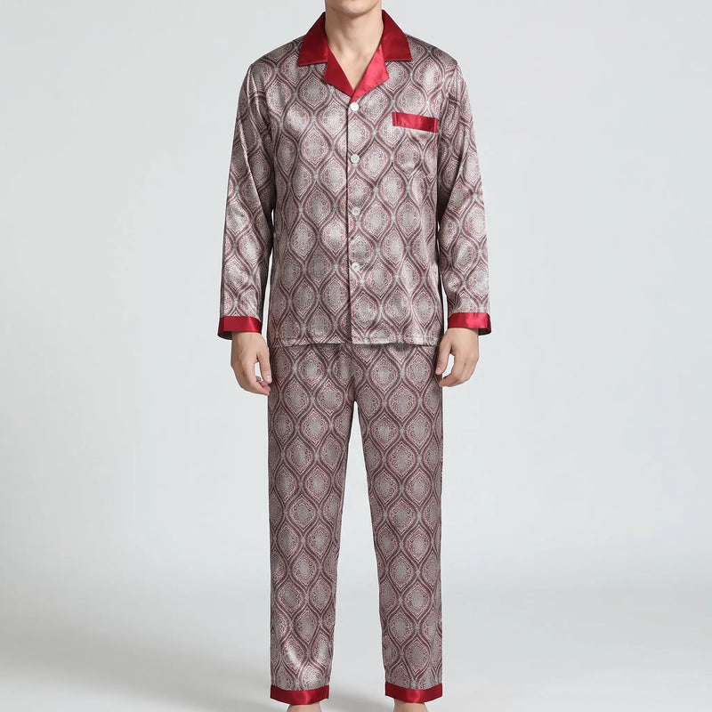 Model wearing a different colourway of the set: a red and grey ornate diamond pattern with red collar, pocket and cuffs. 6