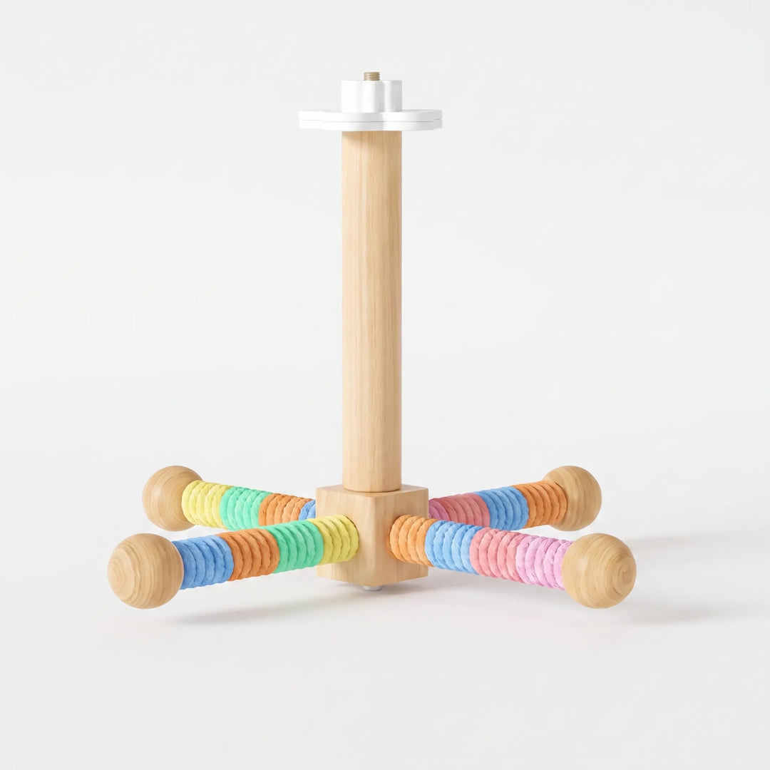 Perch version with rainbow-coloured rope wrapped around the four arms in yellow, green, orange, blue and pink sections. 4