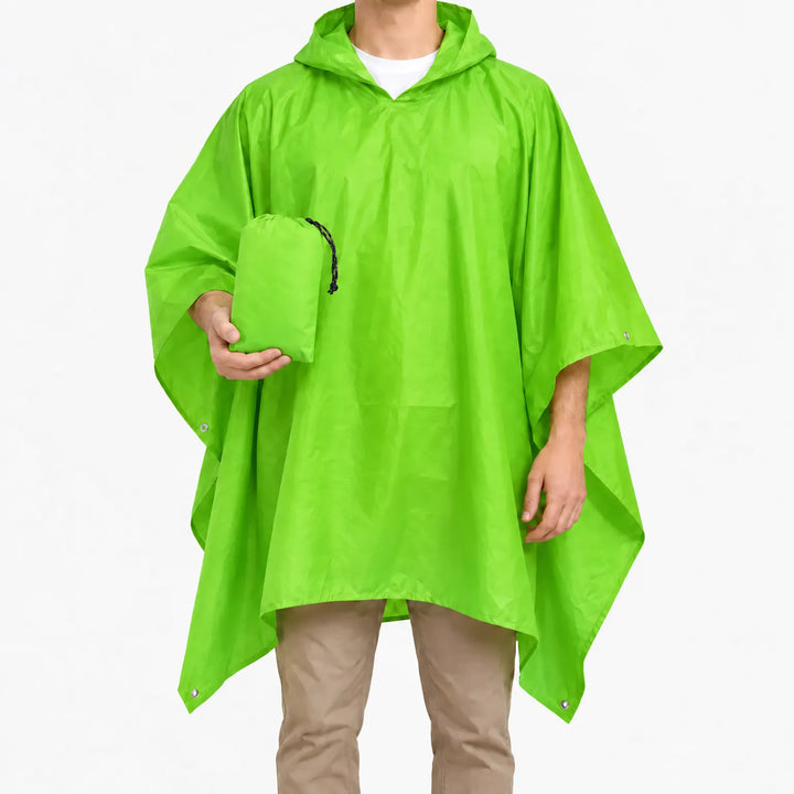 Bright green version of the hooded poncho worn on a model, who holds the matching green drawstring pouch. 7