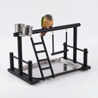Black-finished version of the wooden playstand with a conure on the top perch, plus ladder, swing, steel cups and tray. 6
