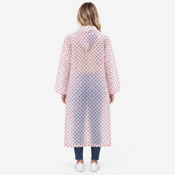 Back view of the translucent red polka dot raincoat, showing the hood, gathered long sleeves and full length. 4