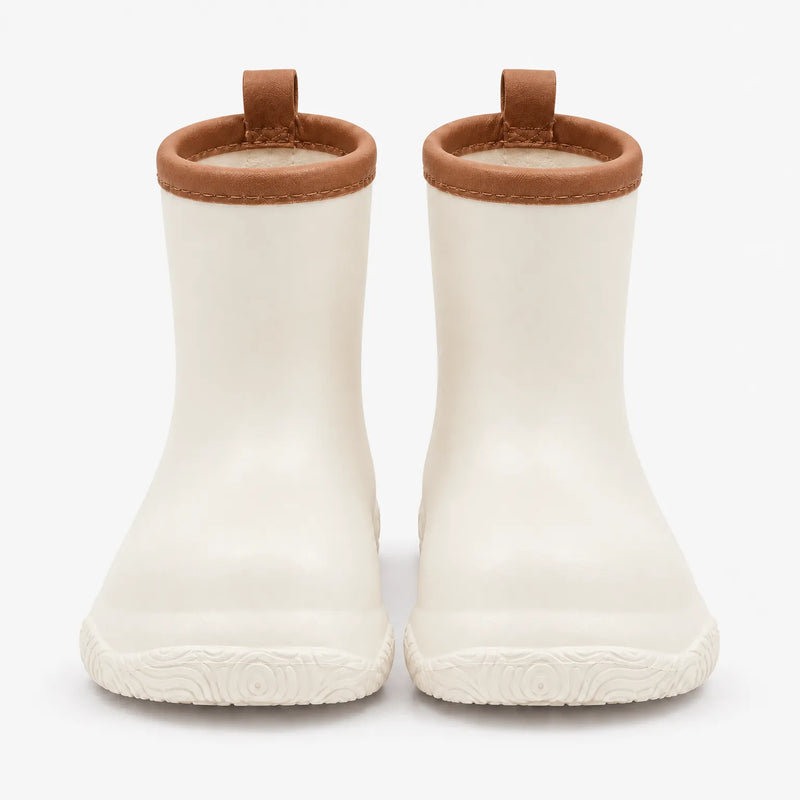Front view of a pair of cream wellies with brown stitched collars, brown pull loops and a swirl-patterned sole. 10