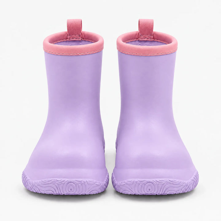 Front view of a pair of lilac wellies with pink stitched collars, pull loops and a swirl-patterned sole. 9