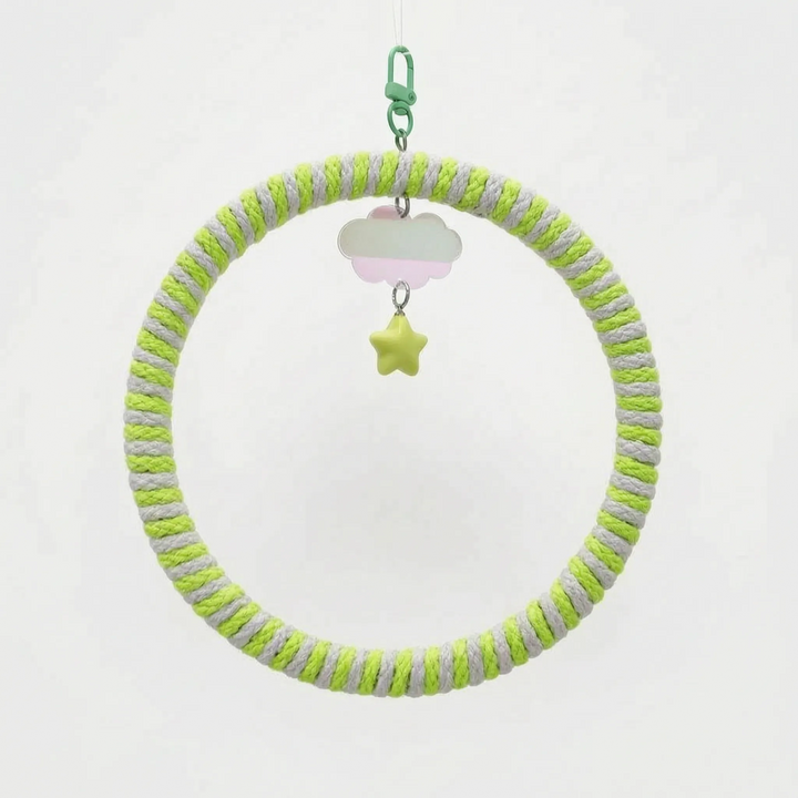 Ring swing wrapped in lime green and grey rope, with a green clip, iridescent cloud charm and yellow-green star. 4
