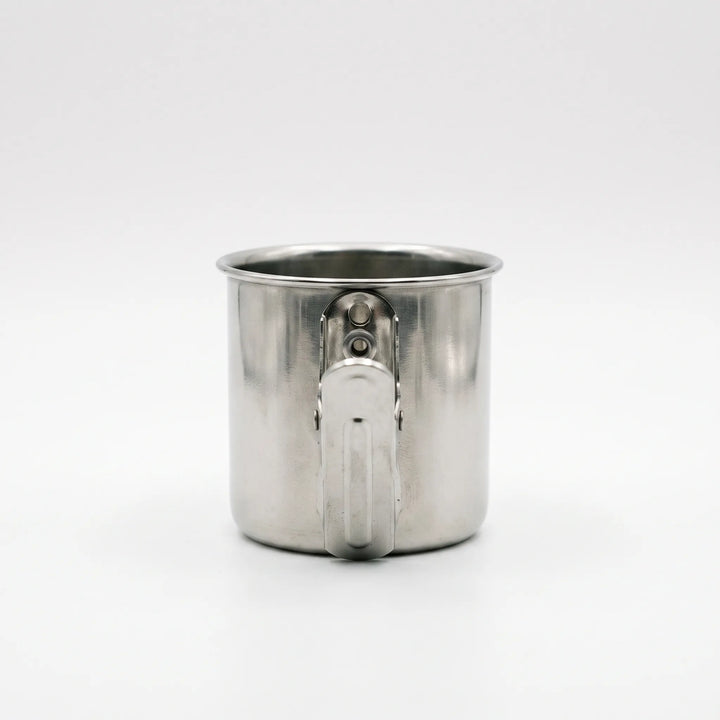 Back view of a steel cup showing the flat spring clip fixed to its side with two rivets. 4