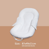 Ergonomic baby nest with back support and mesh sleeping surface – Cosynido