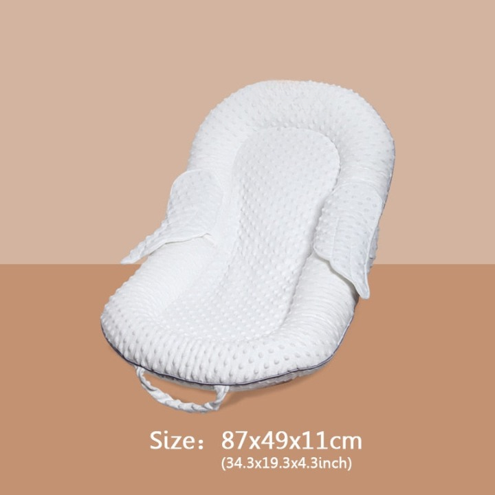Ergonomic baby nest with back support and mesh sleeping surface – Cosynido