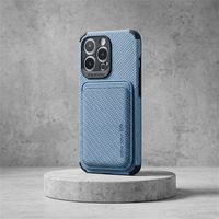 Blue woven-texture case with card pocket on the back, shown upright on a round concrete plinth 4