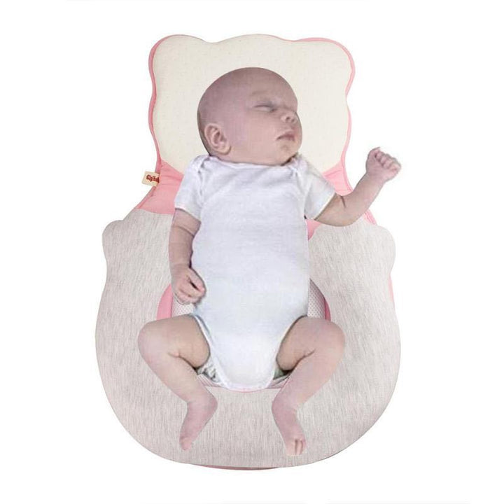 Soft positioning pillow for newborns with leg support – CozyNest