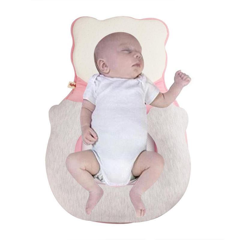 Soft positioning pillow for newborns with leg support – CozyNest