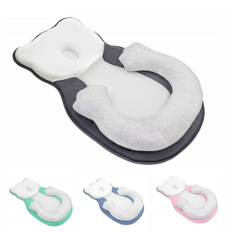 Soft positioning pillow for newborns with leg support – CozyNest