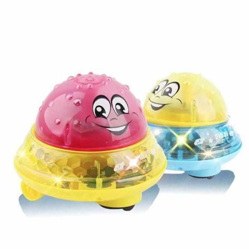 Bath toy ball with light effects, fountain and motorised drive for children