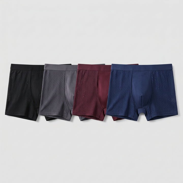 Flat lay of four boxers in black, grey, burgundy and navy with mesh side panels 3