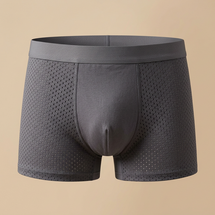 Front view of grey boxer shorts with perforated mesh side panels and a smooth centre pouch 5