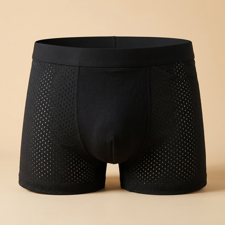Front view of black boxer shorts with perforated mesh side panels and a plain centre pouch 8