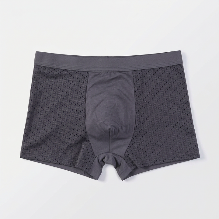 Single pair of dark grey boxers laid flat, showing the plain centre panel and mesh sides 6