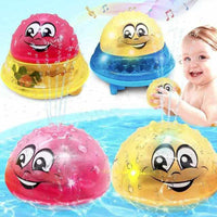 Bath toy ball with light effects, fountain and motorised drive for children