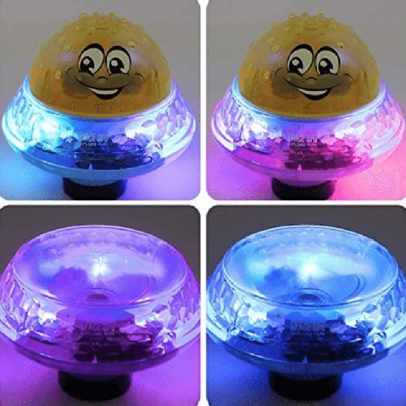 Bath toy ball with light effects, fountain and motorised drive for children