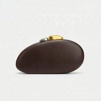 Sculptural Shell-Shaped Clutch Bag - Peblique
