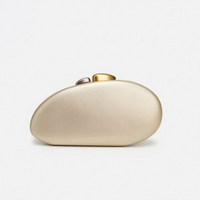 Sculptural Shell-Shaped Clutch Bag - Peblique