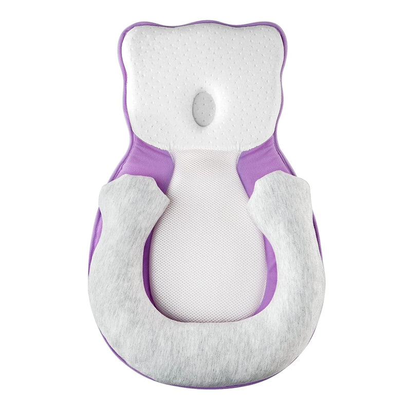 Soft positioning pillow for newborns with leg support – CozyNest