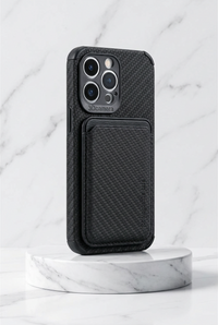 Black carbon-effect case with card holder standing on a round marble plinth 7