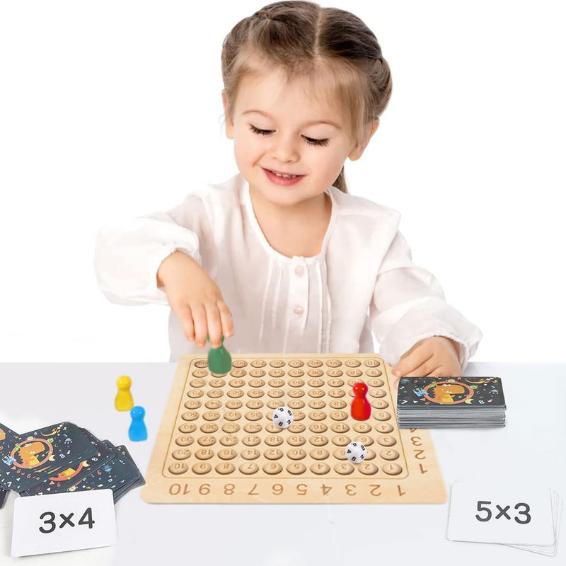 Learning game: wooden board for the 1–10 times tables with cards and dice