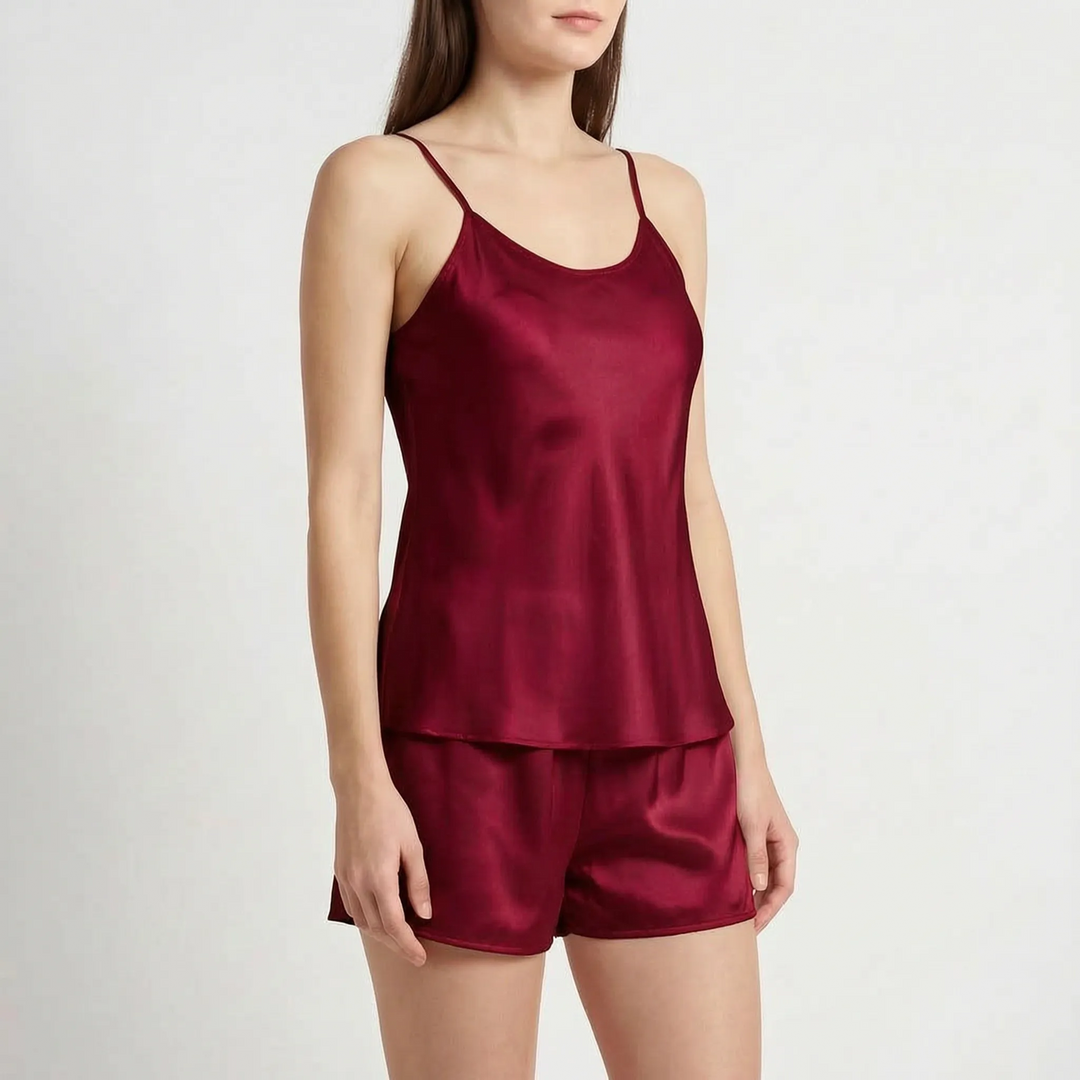 Model in the deep burgundy satin camisole and shorts set, shown at a slight angle. 10