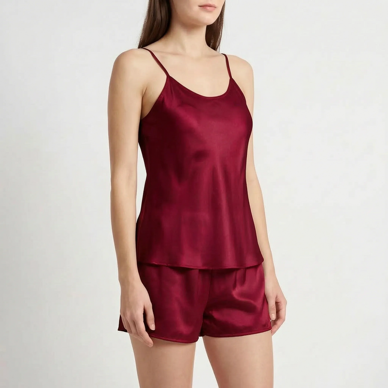 Model in the deep burgundy satin camisole and shorts set, shown at a slight angle. 10