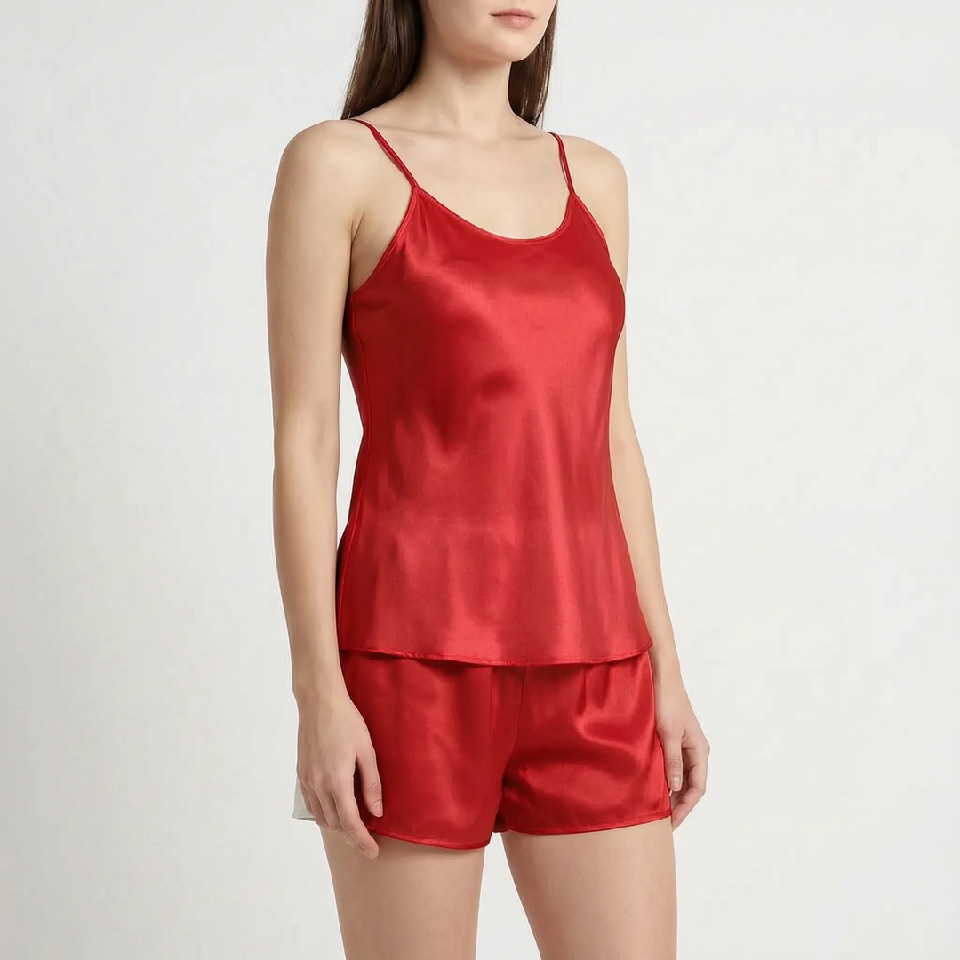 Model in the bright red satin camisole and shorts set, shown at a slight angle. 14