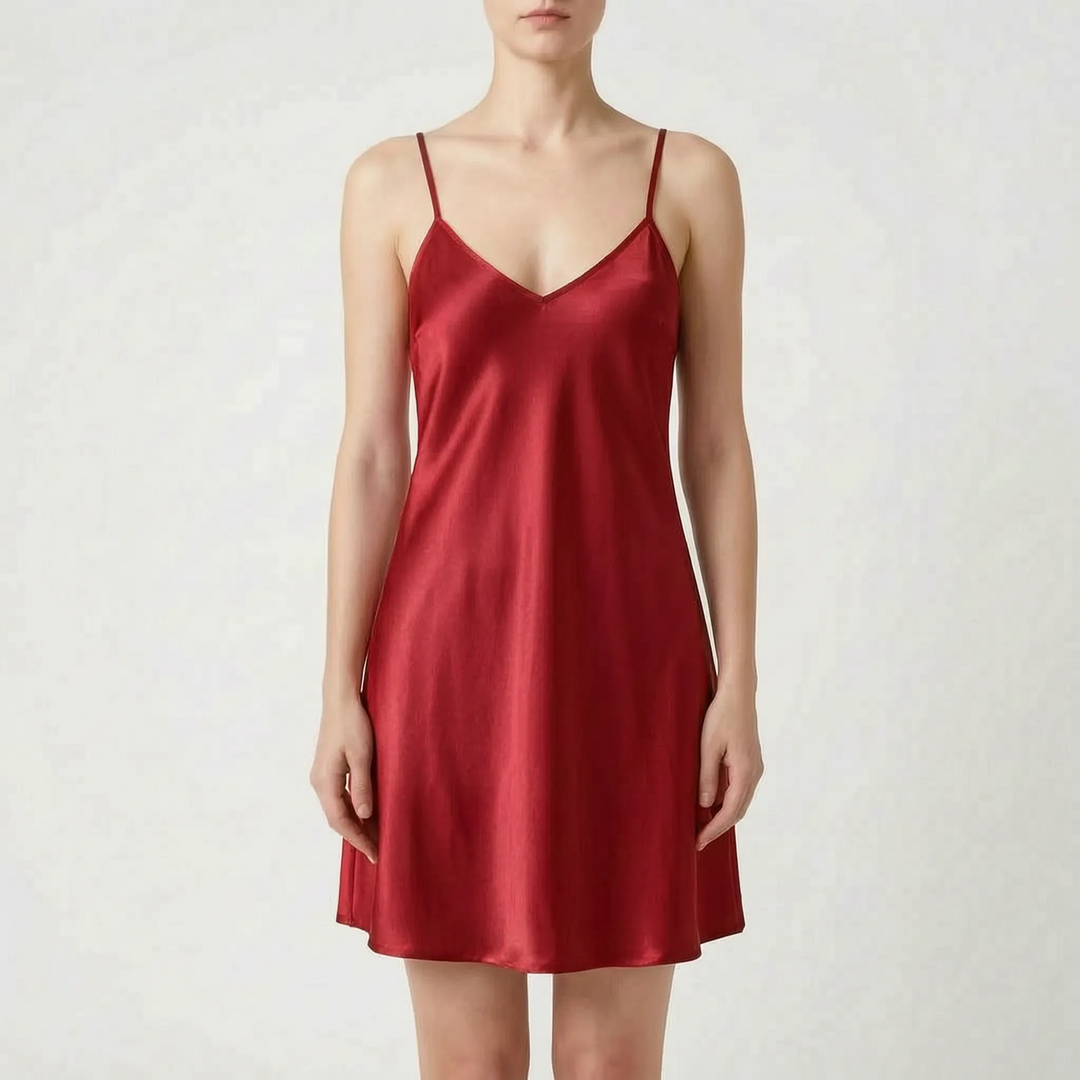 Front view of the same satin slip nightdress in deep red, worn by a model against a light backdrop. 8