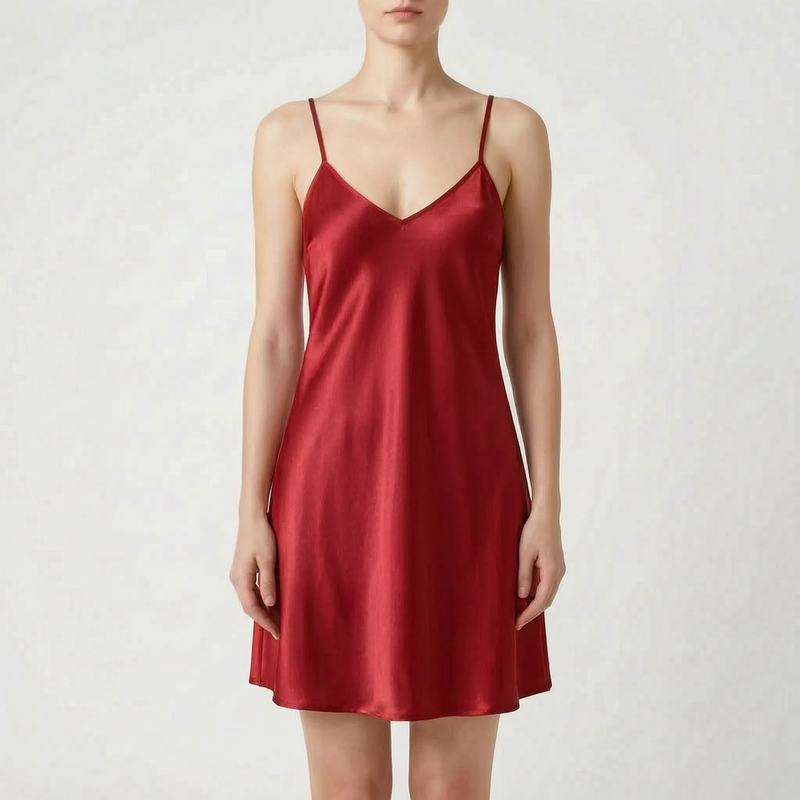 Front view of the same satin slip nightdress in deep red, worn by a model against a light backdrop. 8