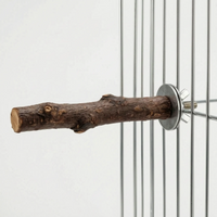 Another side view of the bark perch fixed to cage bars, showing the cut end and the bolt fixing. 5