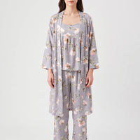 Front view of a model wearing the grey floral set: open long robe, gathered camisole top and wide trousers. 2
